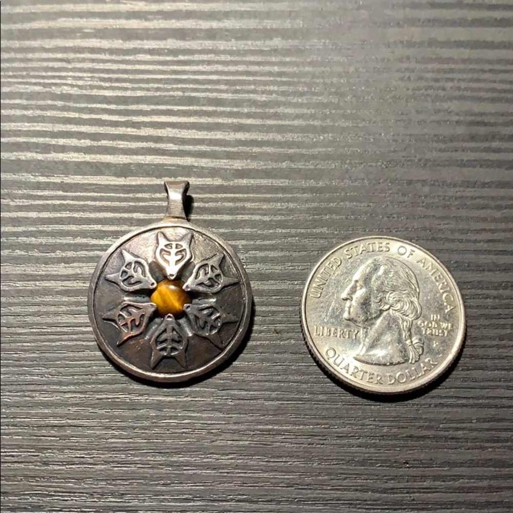 Silver pendant with tigers eye